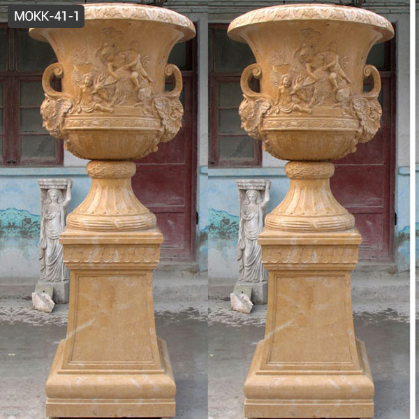 outdoor yellow pedestal urn planter design