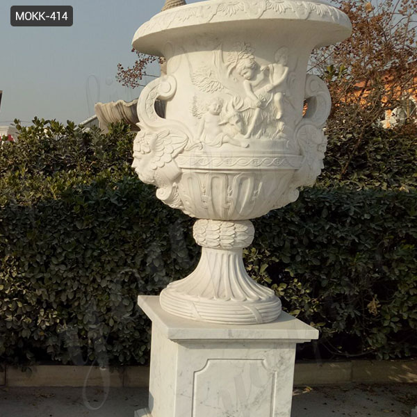interior grey pedestal urn planter design